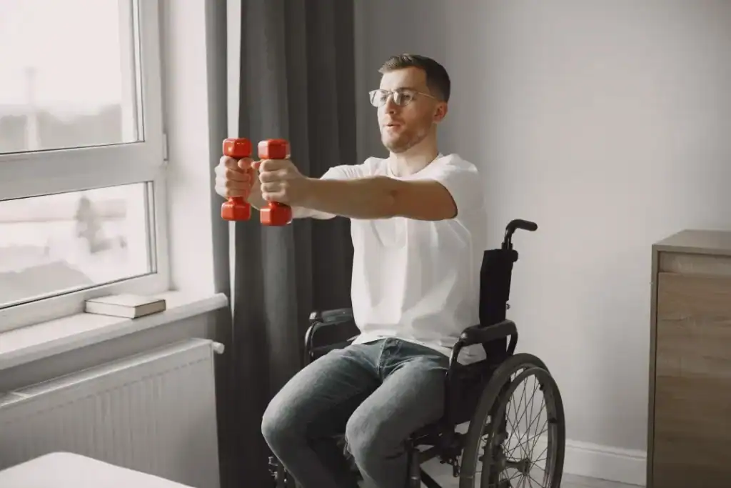 Image of man doing exercise in his wheelchair to aid weight loss Basingstoke 