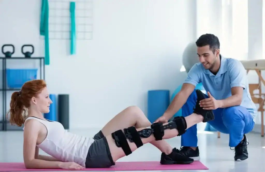 Woman having treatment to help muscle recovery Basingstoke  after an injury